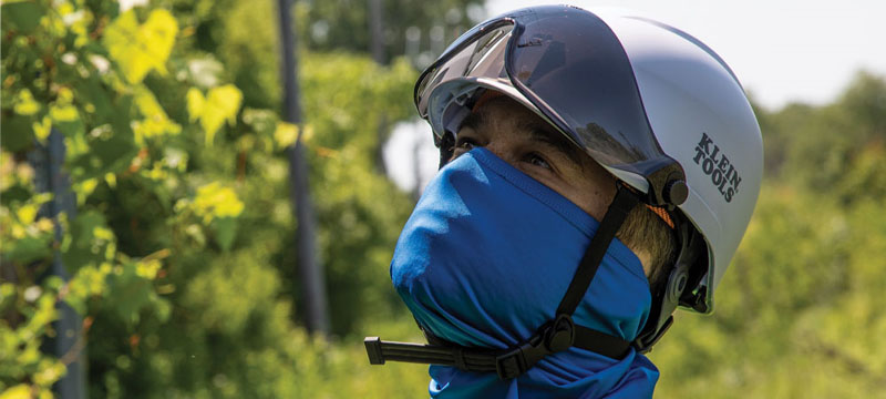 Tradesman wearing a klein tools hard hat